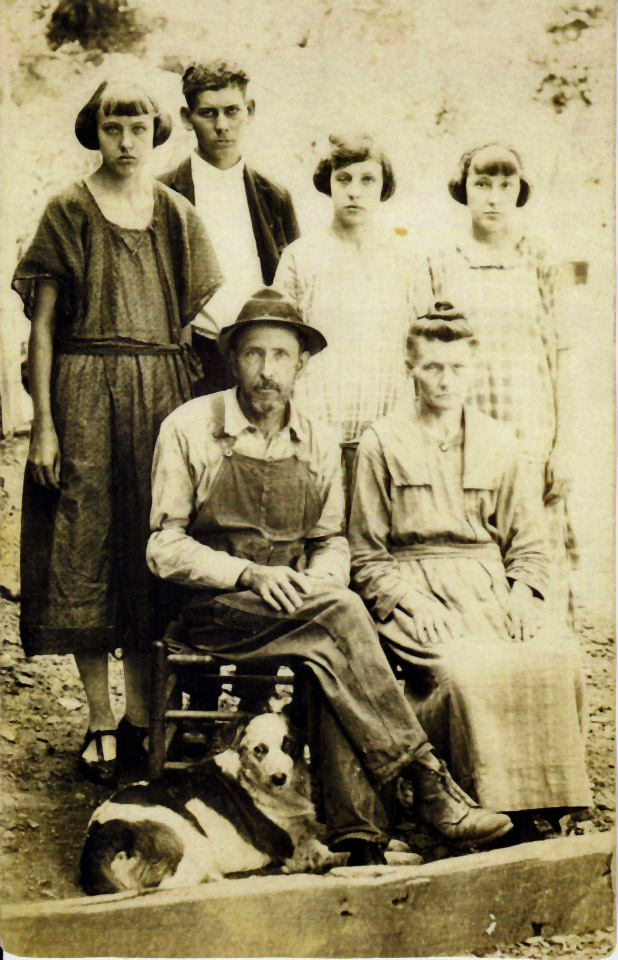 Hazel with Matt, sisters, and parents
