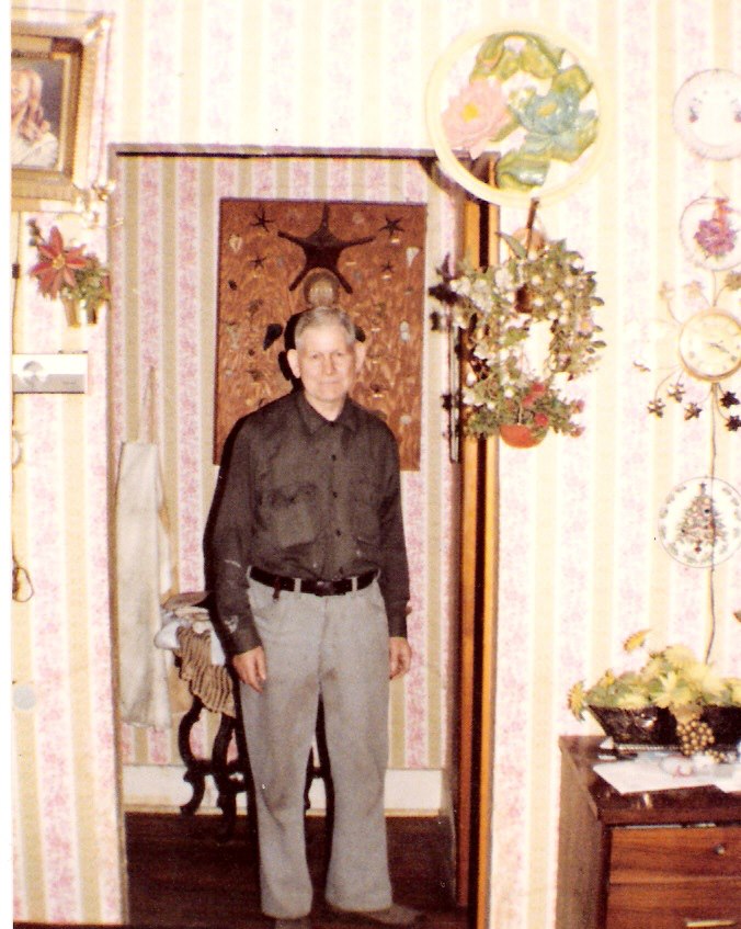 Matt Rogers standing inside home