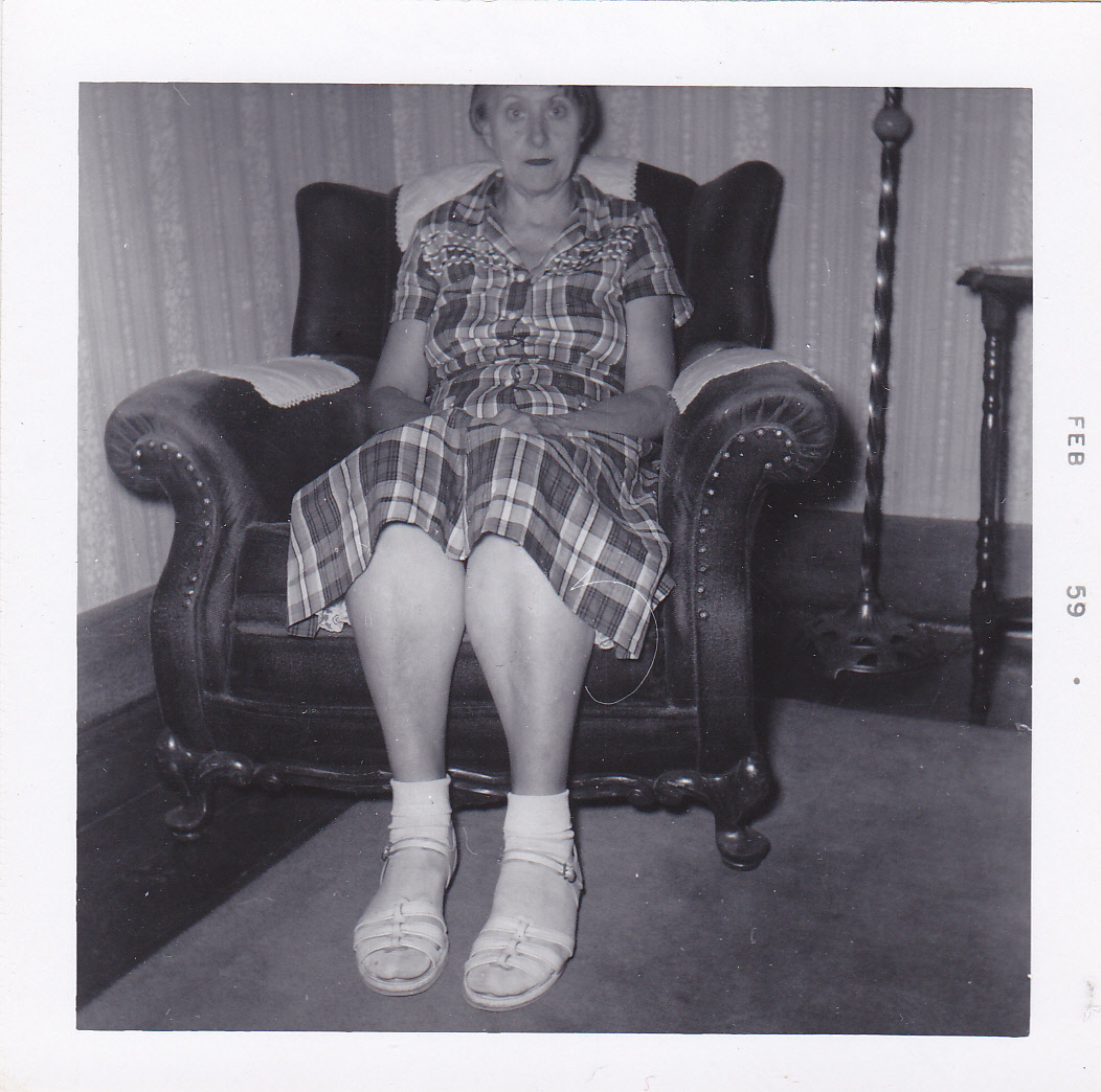 Hazel sitting with in chair with hands in lap