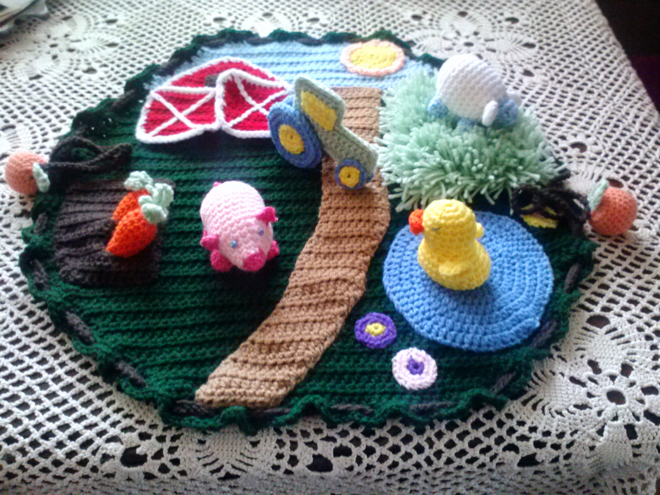 Crocheted barnyard play mat