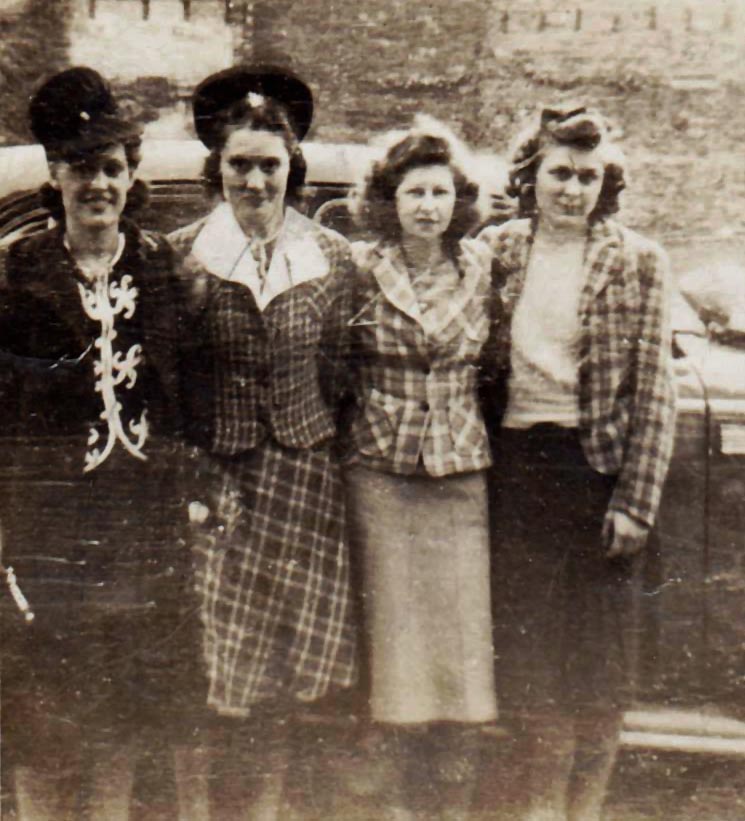 Mae, Mary, Gazella, and Eva standing together