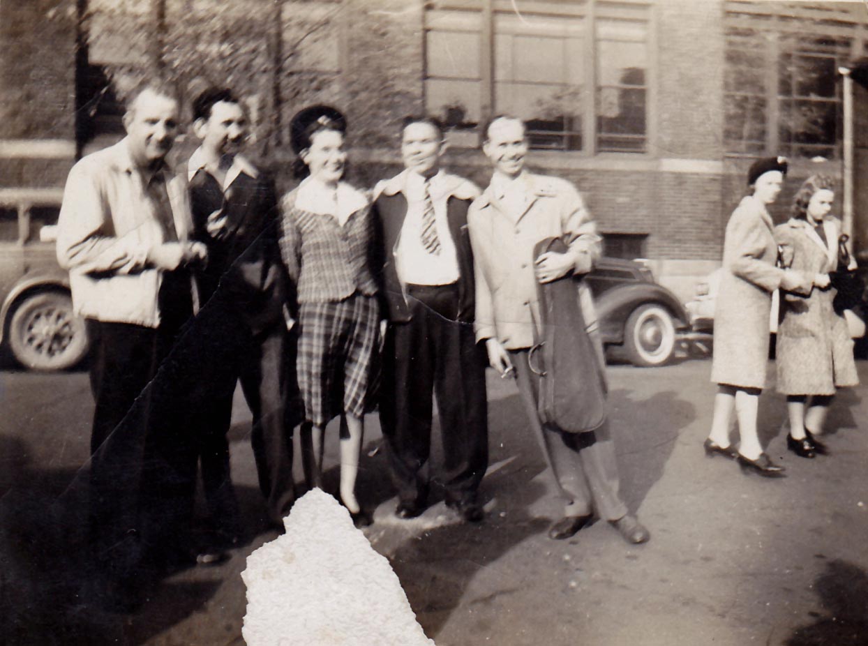 Mary standing with members of the Prairie Ramblers
