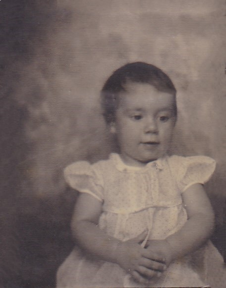 Toddler Virginia in white dress