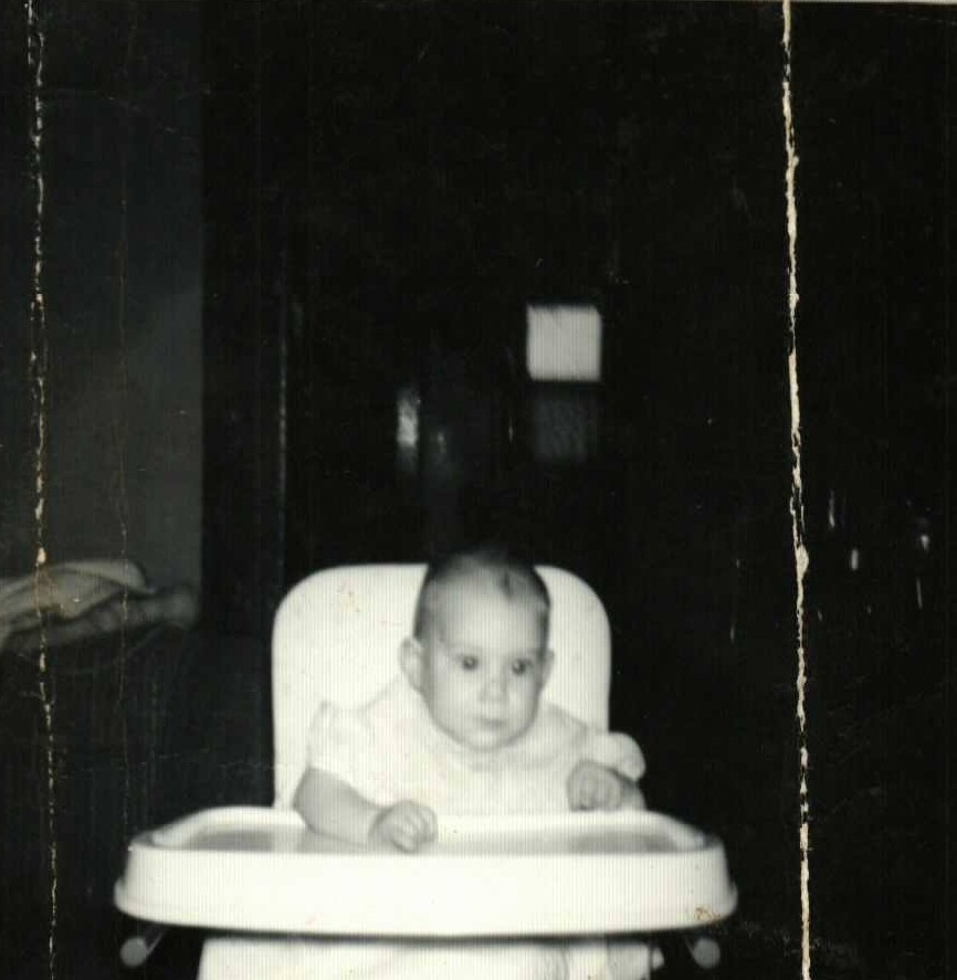 Rebecca Rogers in high chair