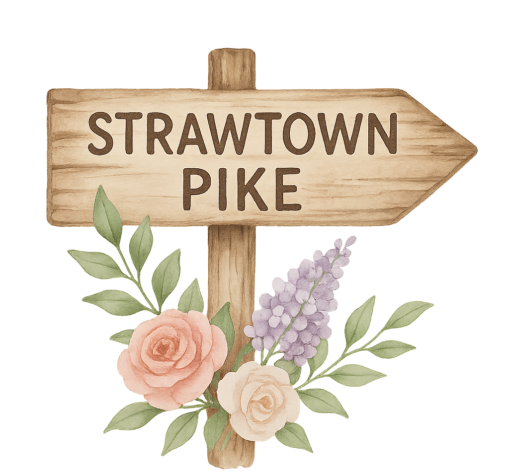 Strawtown Pike wooden sign with flowers