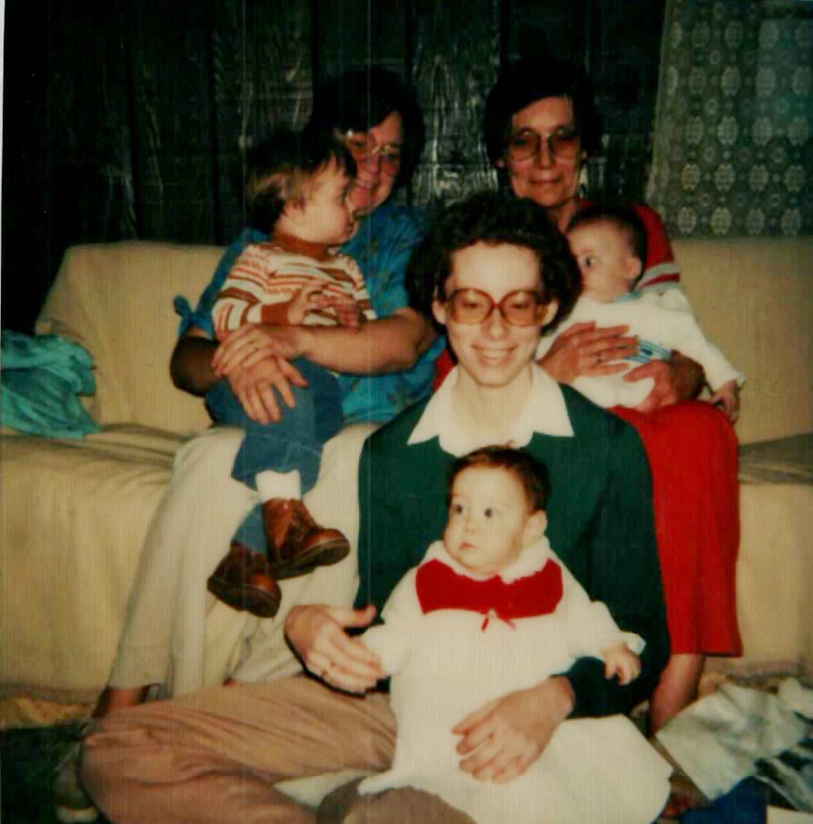 Virginia Rogers holding Jeremey Miller, Mary Doan holding Shane Miller & Mischelle Pulver holding Elizabeth Pulver