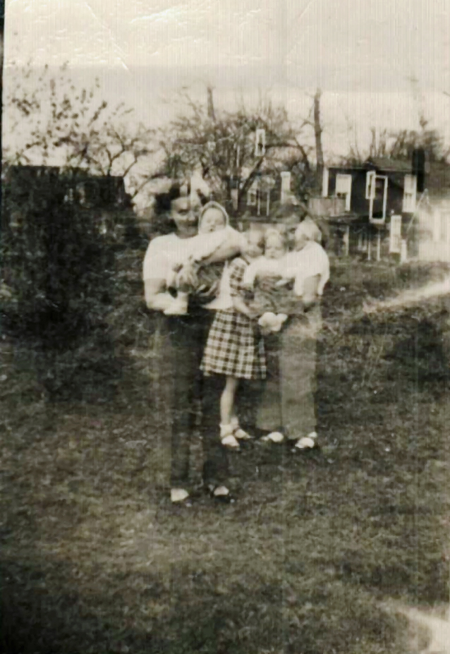 Mary Doan holding Virginia Simmons-Doan Not sure who the other people are